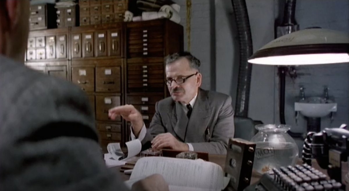 Ian Holm's Kurtzmann, for example. (Gilliam worked for Harvey Kurtzman, so I guess that's homage.) It's great that he has the incompetent cunning to injure his own hand (or feign injury) so Sam will sign the check for him (which forgery later ends up on Sam's charge sheet.)