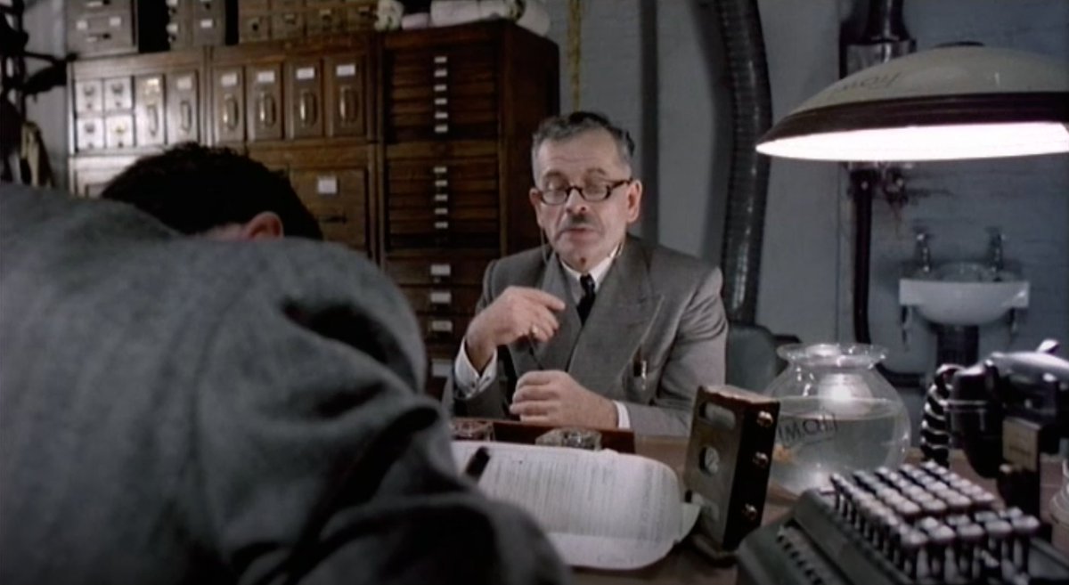 Ian Holm's Kurtzmann, for example. (Gilliam worked for Harvey Kurtzman, so I guess that's homage.) It's great that he has the incompetent cunning to injure his own hand (or feign injury) so Sam will sign the check for him (which forgery later ends up on Sam's charge sheet.)