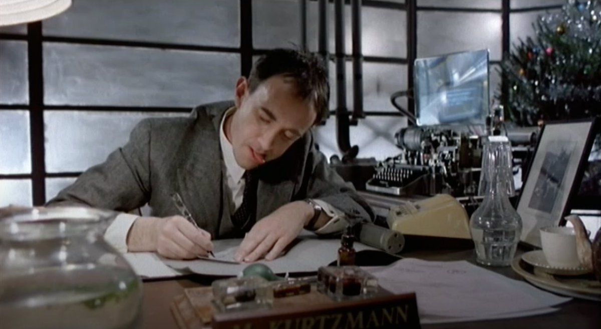 Ian Holm's Kurtzmann, for example. (Gilliam worked for Harvey Kurtzman, so I guess that's homage.) It's great that he has the incompetent cunning to injure his own hand (or feign injury) so Sam will sign the check for him (which forgery later ends up on Sam's charge sheet.)