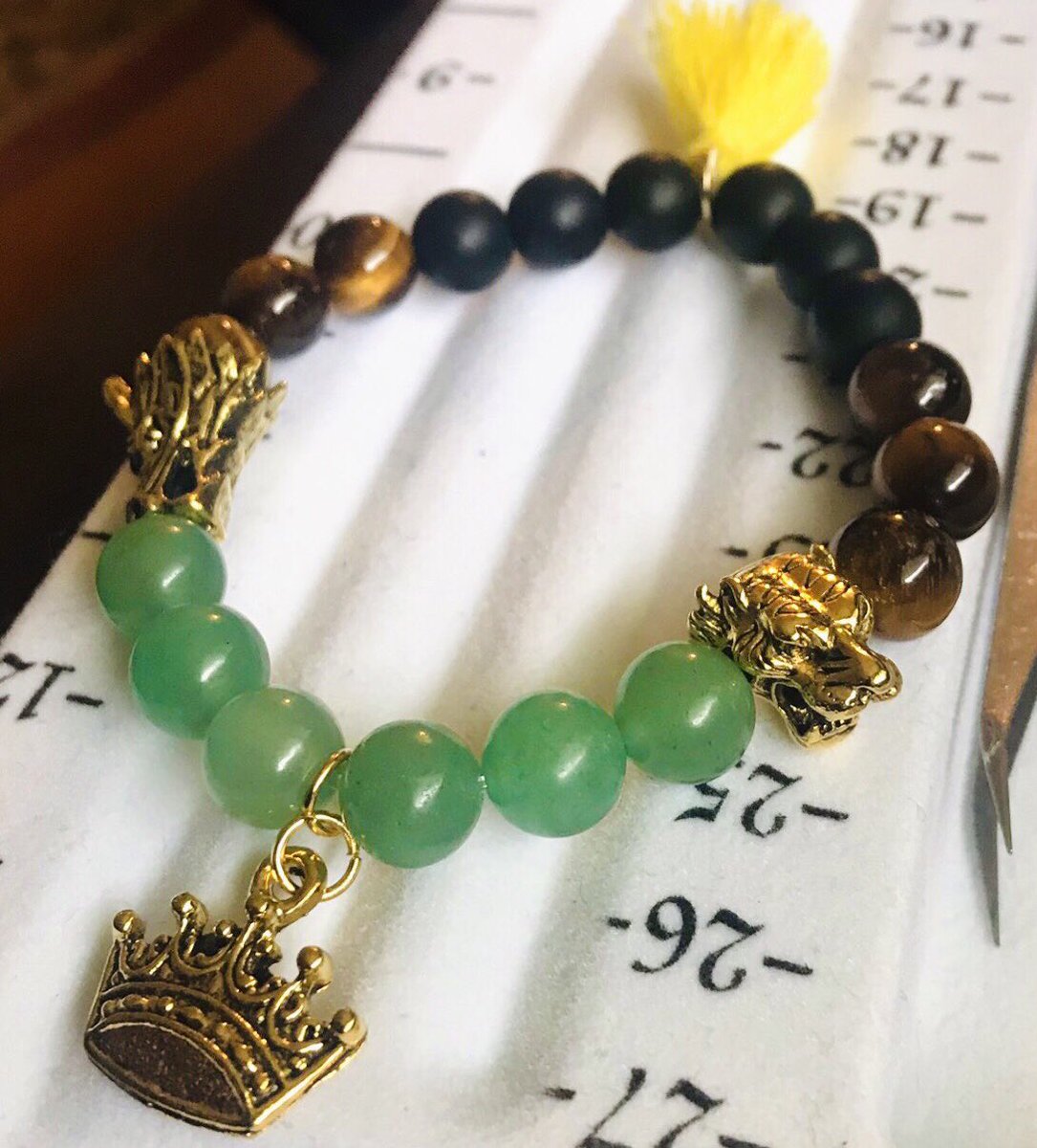 hwagaemarketpin's tweet photo. 🐉Daechwita Bracelets🐉:
After weeks of waiting on a charm, they finally arrived today. We were excited to make this idea a reality, and we’re pleased with the results.
#d2 #daechwita #agustd2 #agustd #hmpupdates https://t.co/kHcTH12qpL