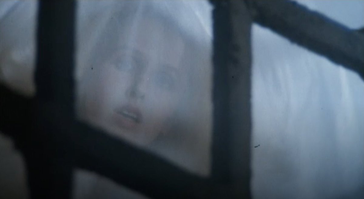 The tinest, most cutting in-film indictment of his dreamy character is the scene in which he is riding the weird tram-box home, drawing long, fantasy hair on his Jill print-out, going off into one of his weird reveries of chivalric-heroic rescue of the distressed damsel.