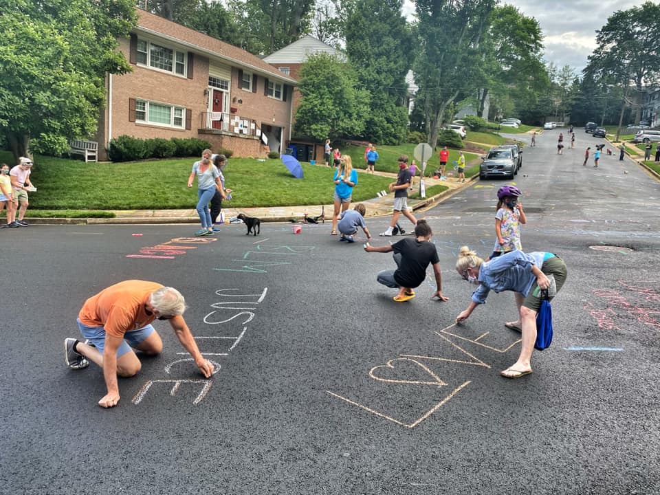 Supposed to rain overnight and neighbors already committing to just chalk more again tomorrow.Here are a few more of the scene of neighbors chalking up the street which was powerwashed:
