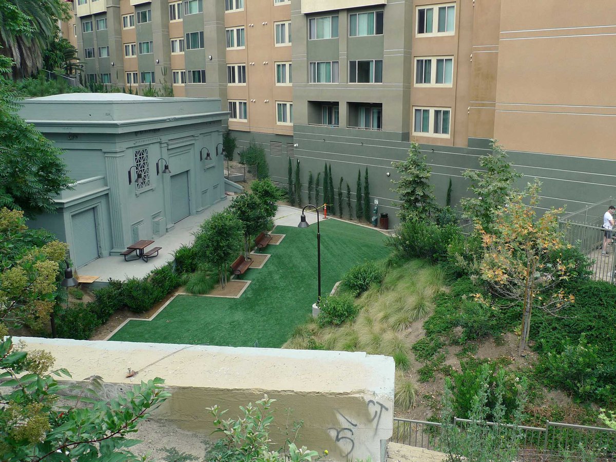 The opposite end of the tunnel was sealed in 2007 to make way for, coincidentally, another apartment complex - Belmont Station, built in front of the tunnel on the former Toluca Yard site. The power substation remains & a Red Car mural appears on the wall covering the tunnel.
