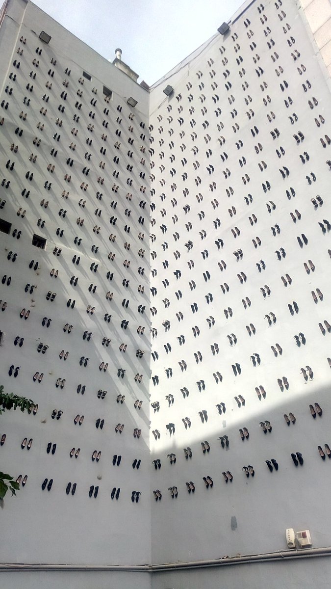 440 pairs of women's shoes were hung on one of the city walls in Istanbul. This is the number of women murdered by their husbands in Turkey during last year.