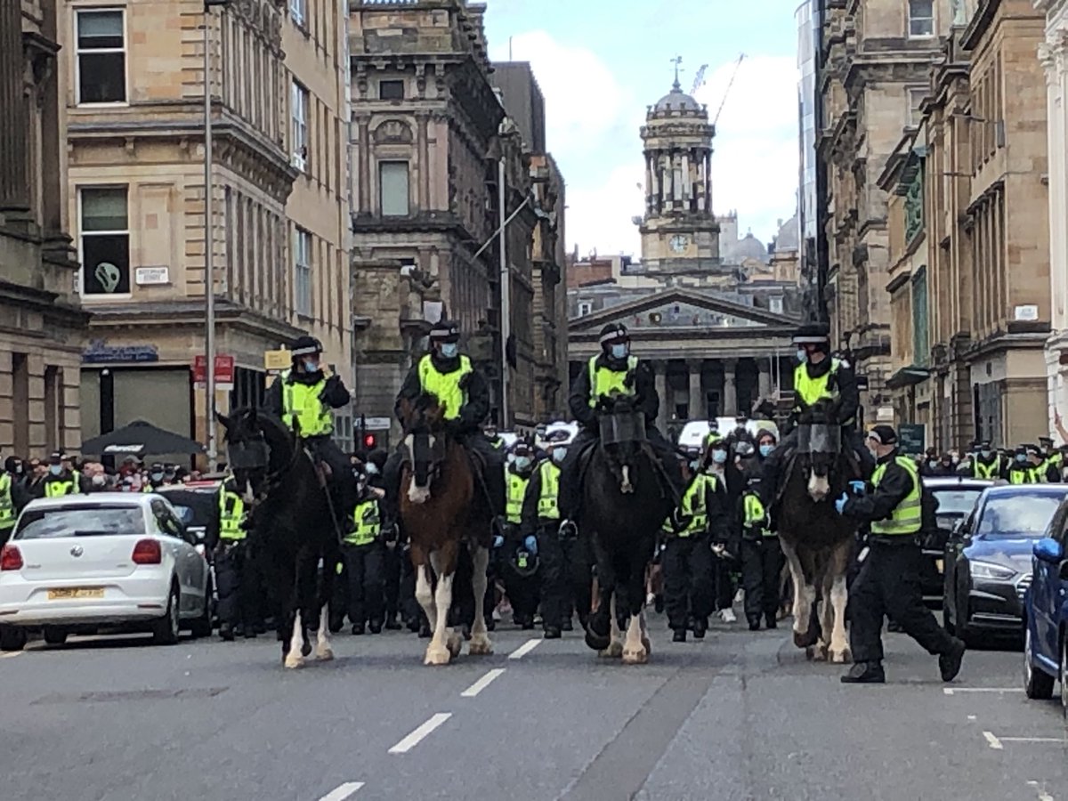 LauraPatersonPA's tweet image. Police controlling Black Lives Matter supporters as they leave an anti-racism rally in George Square, Glasgow