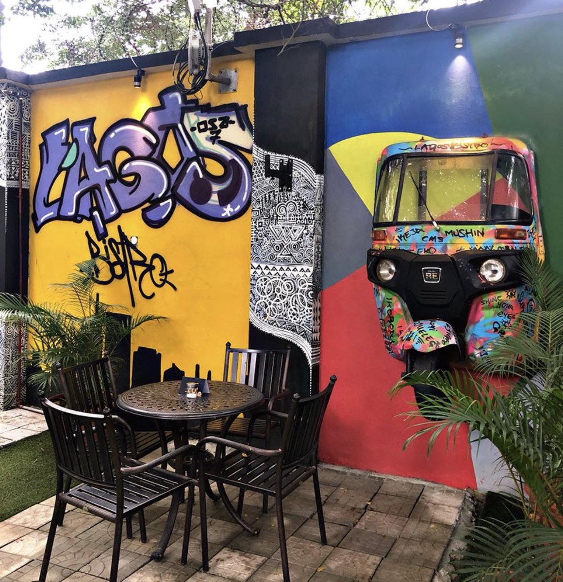 LAGOS BISTRO . Called Lagos Bistro but located in the heart of Abuja. Has a typical Lagos feel and a lot of art. There’s a Danfo bar and kekenapeps hanging on the walls and a lot of funny writings. Nice food and a nice outdoor section. Picture perfect too.
