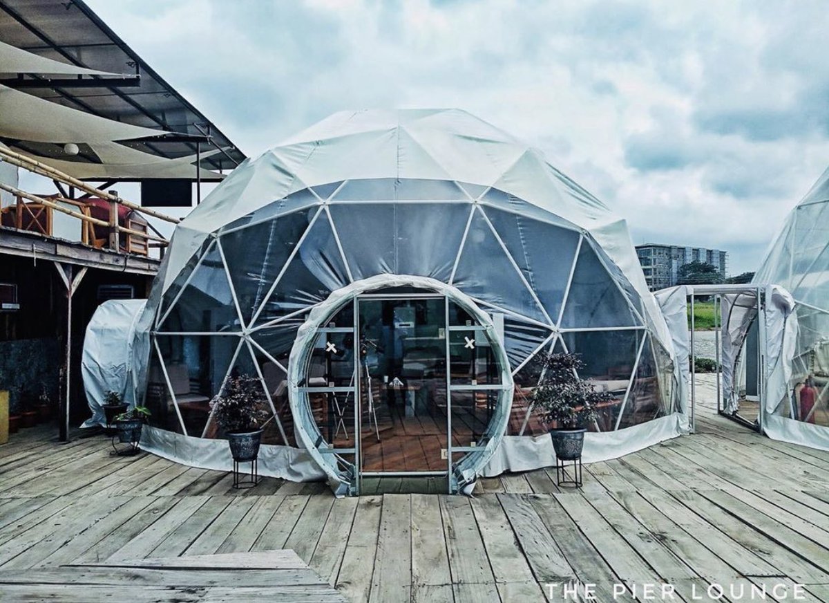 PIER RESTAURANT AND LOUNGE .The layout of this restaurant is different from your usual Abuja spot. The igloo like tents are captivating. Imagine going on a date on a rainy day and being able to watch drops of rain splash on d tent or stare at the stars on a dark night. Amazing!
