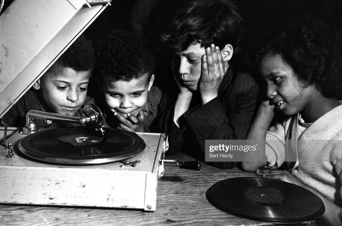 No one is born racist . #LoveMusicHateRacism.Bute Town, Cardiff, 18th April 1950. Photo by Bert Hardy