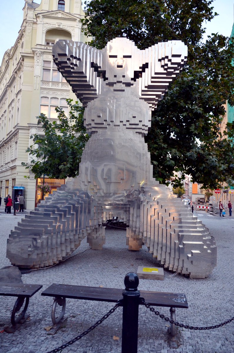 This is David Černý's In Utero sculpture. She once stood near Old Town in Prague, but she’s no longer there. She was hollow so people could stand inside her to experience being inside the womb.