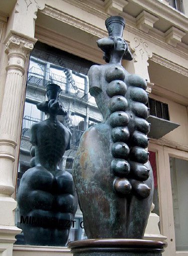 This New York statue is Cybele by Russian artist Mihail Chemiakin. She has eight pairs of breasts, four pairs of buttocks, three animal heads and a human face.  http://www.artatsite.com/NewYork/details/Chemiakin_Mihail_Cybele_Prince_Street_contemporary_statue_art_at_Site_New_York.html