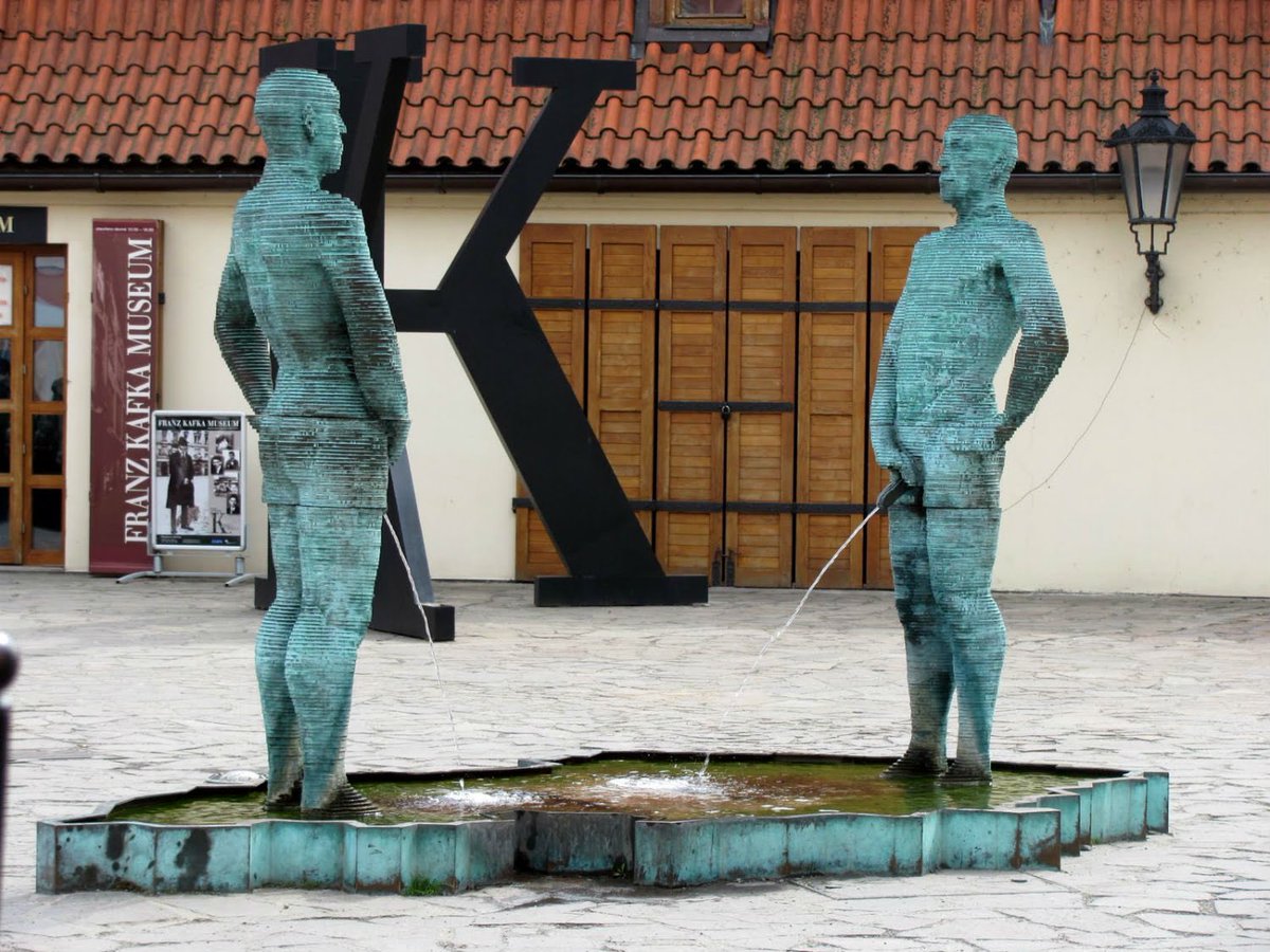 ‘Piss’ is an outdoor 2004 sculpture and fountain by Czech artist David Černý, installed outside the Franz Kafka Museum in Malá Strana, Prague, Czech Republic.