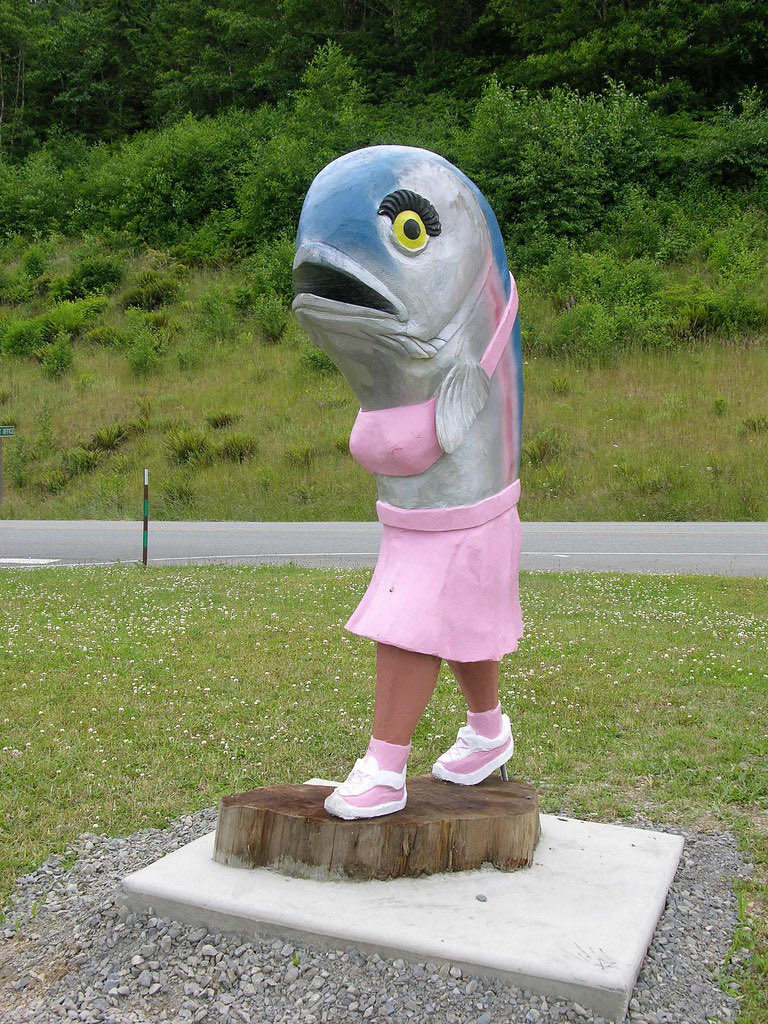 This statue of fish with legs and breasts can be found running towards the small town of Sekiu in Washington. Her name It is Rosie.