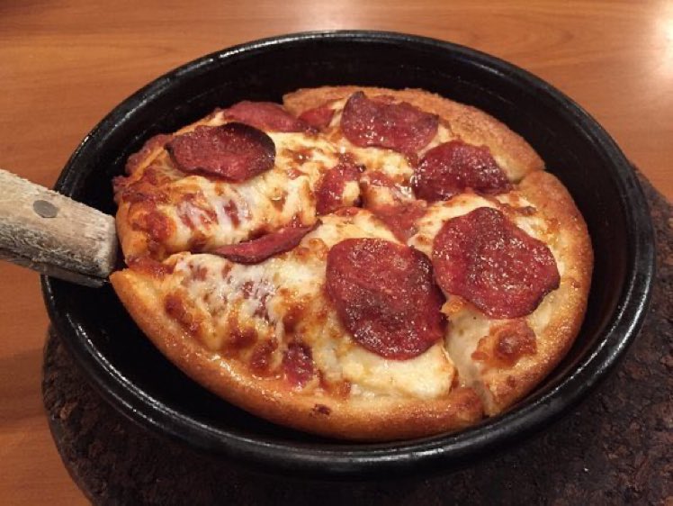 Remember when Pizza Hut pan pizzas were basically a goddamn culinary delicacy? They’d bring them out in a real fucking skillet that was piping at about 700 degrees Fahrenheit right as your third song kicked in on the jukebox after you’d played a game of Galaga. We were kings.