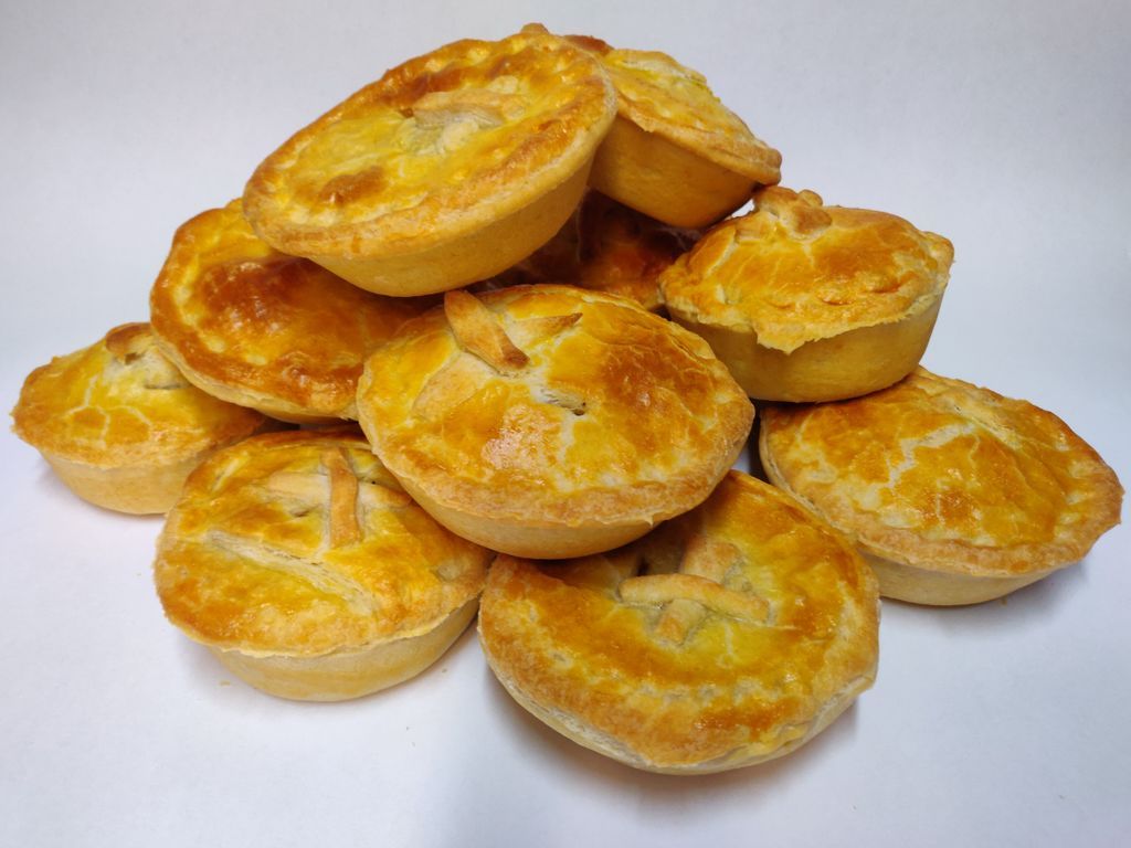 TrueBlueBakery's tweet image. A traditional meat pie. Australian comfort food.

A crisp but soft and buttery pastry bowl holding a special mix of ground beef and gravy, topped with a flaky puff pastry, baked to golden brown.

Soon to be sold at @artisanexchangewcpa and on our website buff.ly/2V3f3fF