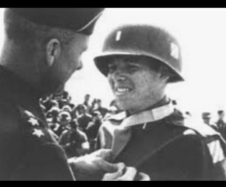 His Medal of Honor was awarded for actions undertaken on Jan 26, 1945, near Holtzwihr, N.E France. Murphy was now a 2nd Lt in command of B Co. They were attacked by 6 German tanks and infantry, who scored a direct hit on an M10 tank destroyer, forcing the crew to abandon it 5/