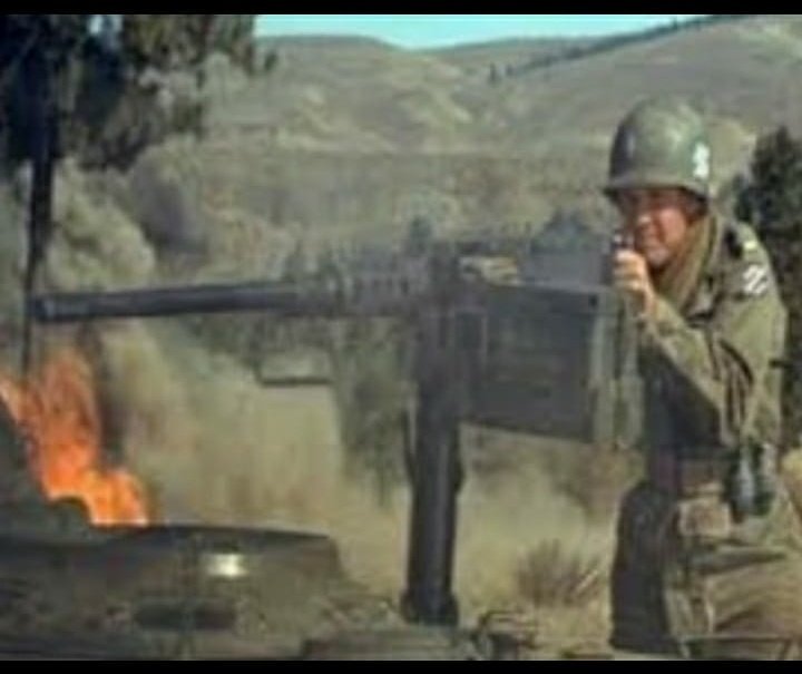 He then mounted the burning tank destroyer and began firing its .50 cal machine gun at the advancing Germans. For an hour he stood on the flamming destroyer returning fire from infantry and tanks. He sustained a leg wound and only stopped after he ran out of ammunition. 7/