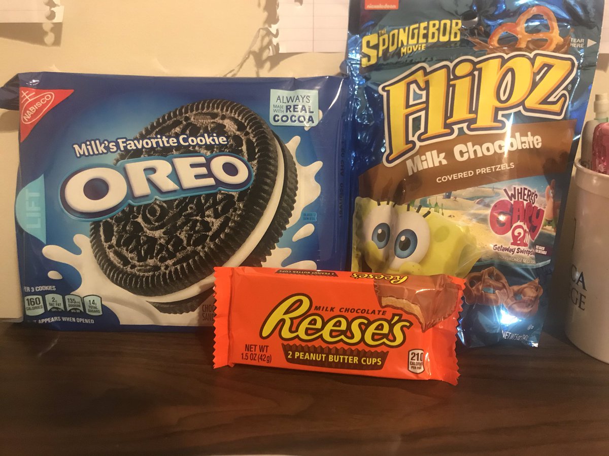 ooomytummyhurt's tweet photo. So these snacks, my favorites, sit right in front of me on my desk at all times. I’m not allowed to open them until I complete my re-edit of my Cinema Prod. 2 film. It’s actually effective? My brain actually shortages when I look at the Reese’s. #prayforanthony https://t.co/NyxyBiOxKY