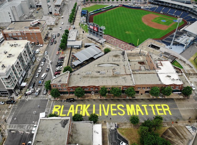 adamchitwood's tweet image. This Black Lives Matter is painted in the Greenwood District, the exact site of the 1921 Tulsa Race Massacre. (4/4)