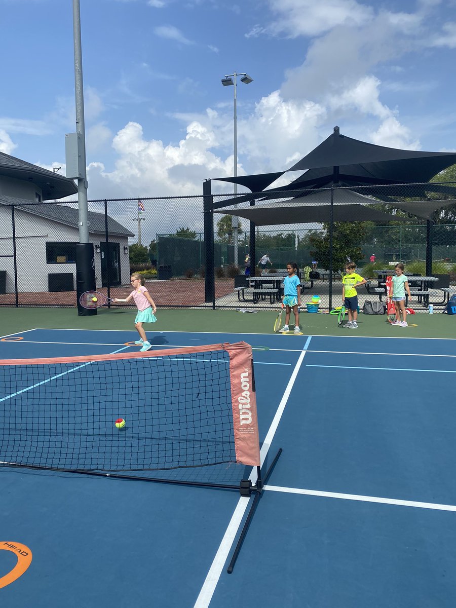 At Winter Park Tennis Center, our goal is to provide a fun learning experience. Look at this beautiful swing, right in the middle.