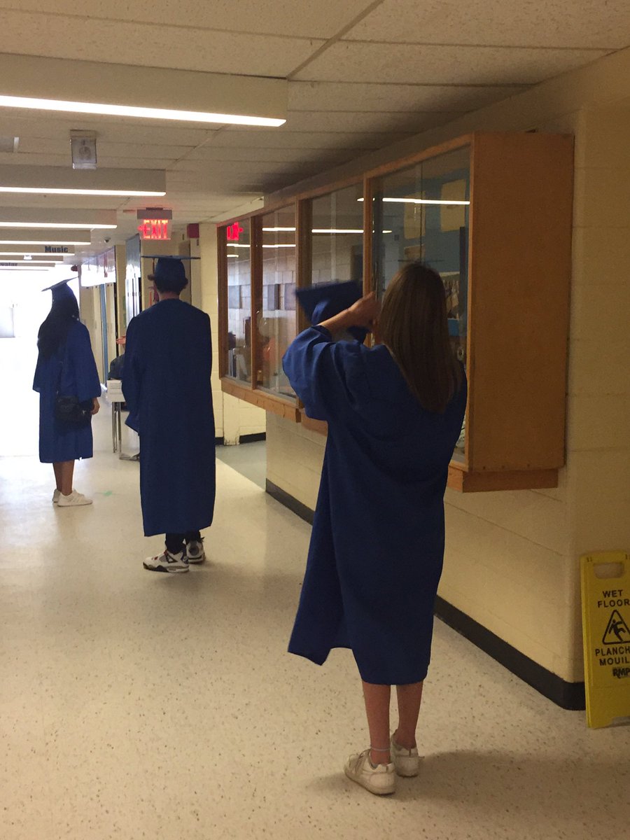 AReid_VP's tweet photo. The celebration of Innisdale’s grade 12 graduation has begun with safe social distancing in cap and gowns.  Congratulations graduates! @principalISS @SCDSB_Schools @deanmaltby https://t.co/ZfCi2iwzIY