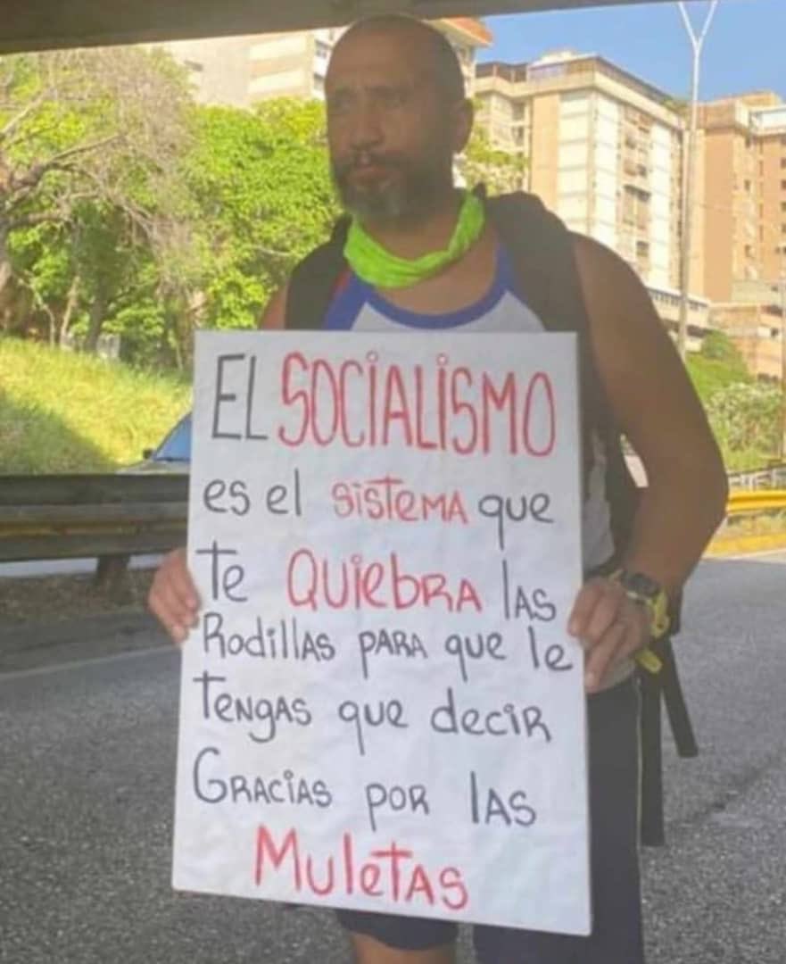 Debber66's tweet photo. “#Socialism is the system where they break your kneecaps so you can thank them for the crutches” ~starving man in #Venezuela https://t.co/mtPueN6DDt