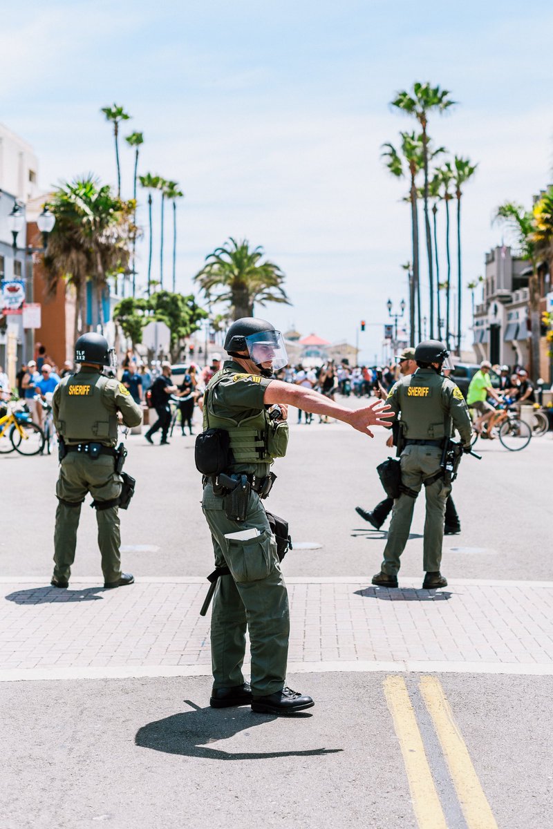 DanCabral's tweet photo. Scenes from the #BlackLivesMattters protest in Huntington Beach 5/30 https://t.co/5ehHVNbtCL