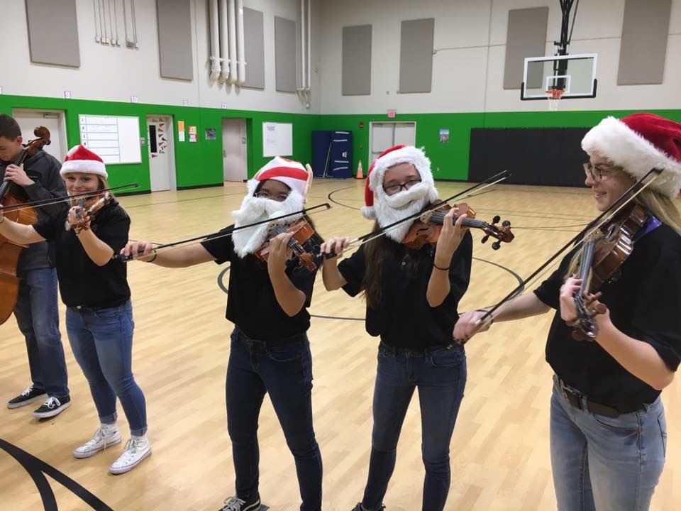 Todd_Berridge's tweet photo. Christmas & #SatinStrings go well together. We must return to school. These traditions & community outreaches MUST be allowed to happen, otherwise the damage to our students & our programs will be catastrophic. Be sanitary...but also demonstrate sanity! #LetThemPlay #LetThemSing https://t.co/ykXocZoPPq