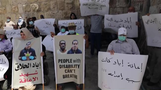 YourAnonCentral's tweet photo. Palestinians with disabilities protest in support of #IyadalHallak a disabled man brutally murdered by US-funded Israeli security forces, and #GeorgeFloyd. Demand an end to impunity and racism. #BlackLivesMatter https://t.co/IJvpLkGutV