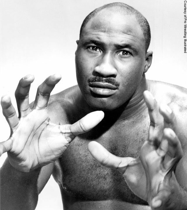 Bearcat Wright is believed to actually be the first black world heavyweight wrestling champion after winning in Indiana in 1961. He also won the WWA title in LA from Classy Freddie Blassie in 1963, just 5 days before MLK’s famous “I Have a Dream” speech.