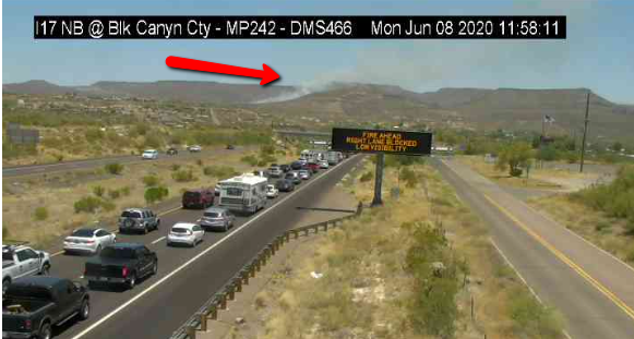 ArizonaDOT's tweet photo. * BRUSH FIRE, expect delays * A smoky brush fire that has closed the right lane of I-17 NB at Black Canyon City is causing a several-mile backup. #aztraffic https://t.co/xznJ4Sz0ZB
