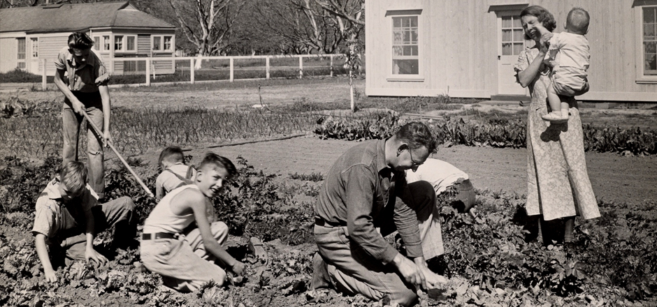 black and white photo of people gardening