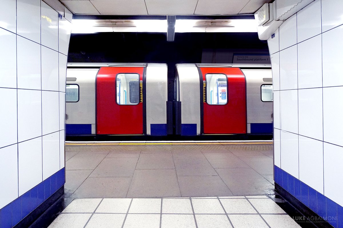 LONDON UNDERGROUND SYMMETRY PHOTO / 44WALTHAMSTOW CENTRALNot quite symmetrical, but a very pleasing & balanced capture when the train centrally aligns.  http://shop.tubemapper.com/Walthamstow-Central-Station/Photography thread of my symmetrical encounters on the London UndergroundTHREAD