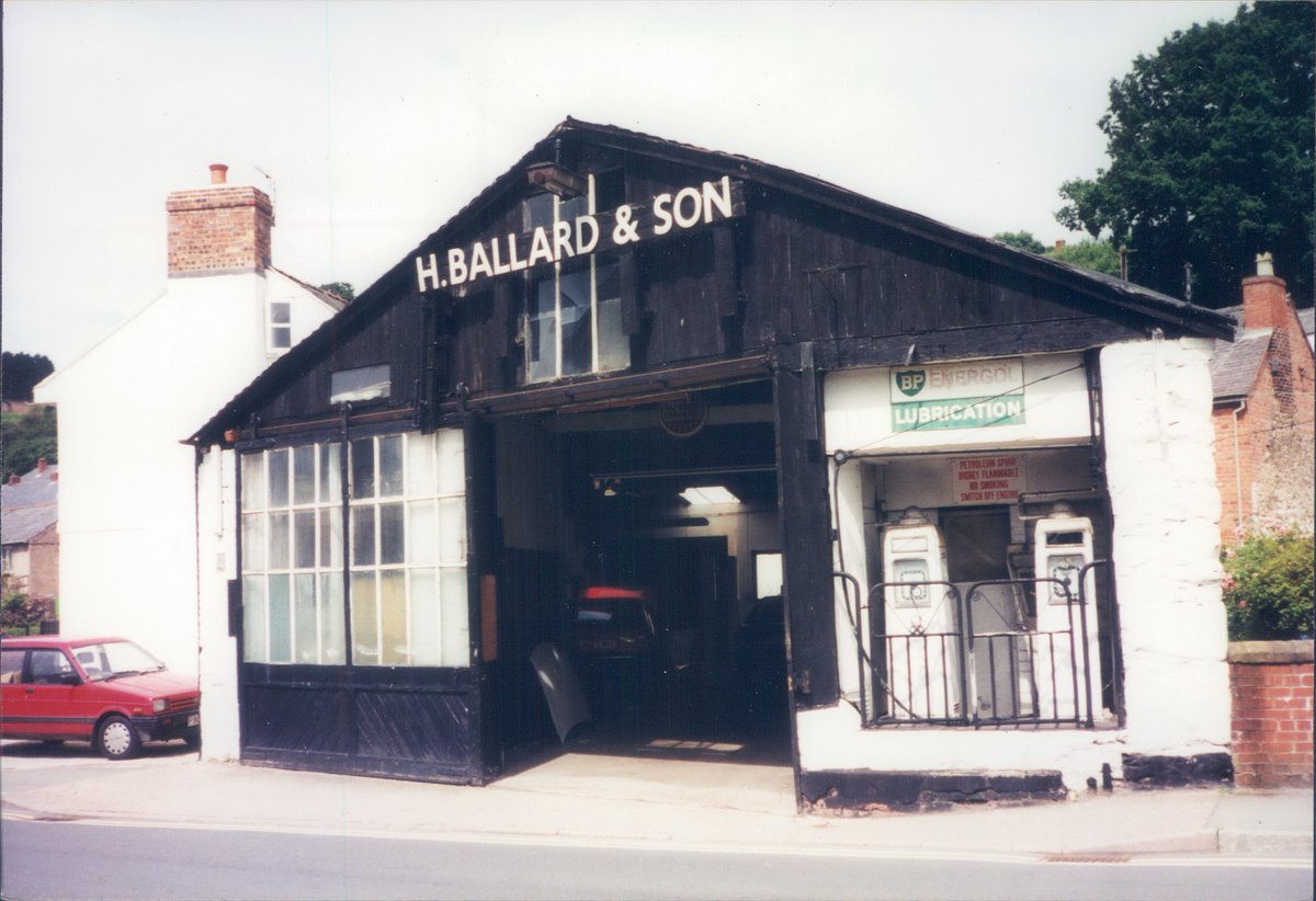 Day 169 of  #petrolstationsH Ballard & Son, Welshpool 1998  https://www.flickr.com/photos/danlockton/16070842357/  https://www.flickr.com/photos/danlockton/16254609331/Both 1920s garage  https://coflein.gov.uk/en/site/85259/details/ballards-garage-union-street-welshpool#site-details & ex-Rover, ex-Burmah site are still there. Kwik Save is now Sainsbury's.What would a JG Ballardian service station look like?