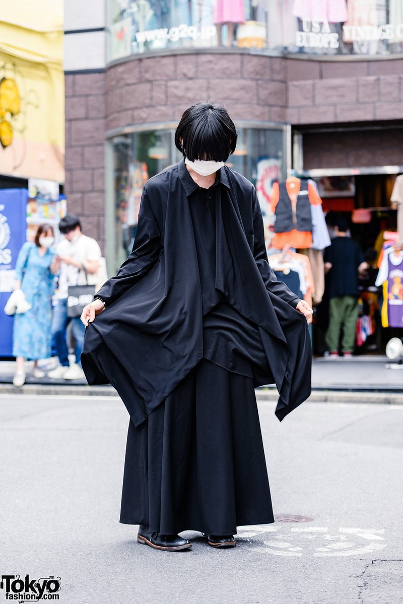 21-year-old Ryo wearing a minimalist monochrome Japanese street