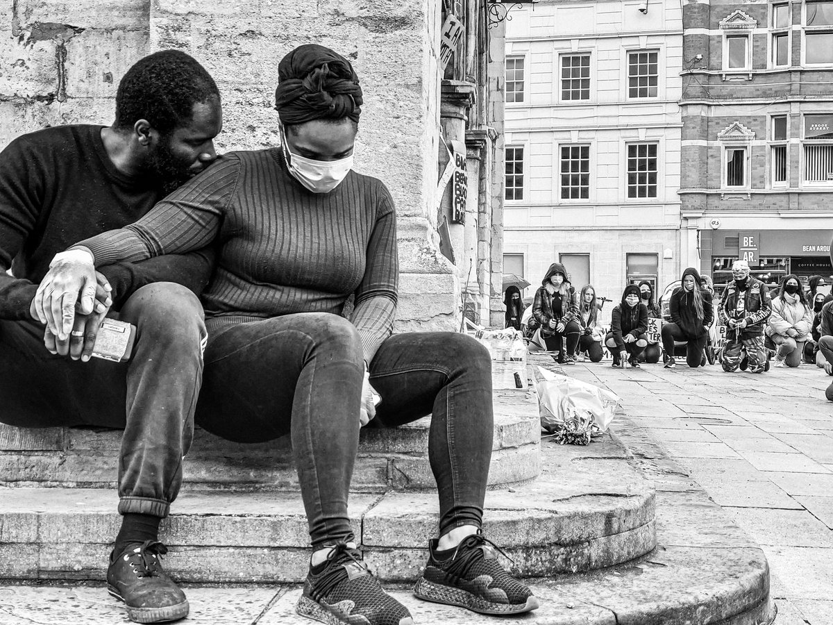 Ashleighhh_I's tweet photo. My favourite photo taken from only a handful I took at Peterborough's #BlackLivesMatter protest on 05/06/2020 during the 8min 46sec silence for the death of #GeorgeFloyd 

A moment of comfort captured between this couple in a beautifully poignant moment. ❤️🖤❤️ https://t.co/jnGHCJlC4R