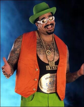Charles Wright has played a lot of roles in wrestling: Papa Shango, Kama Mustafa, Soultaker—but he’s probably best known for being the Godfather, a pimp character who was escorted to the ring by a line of young women he called his “ho train.”