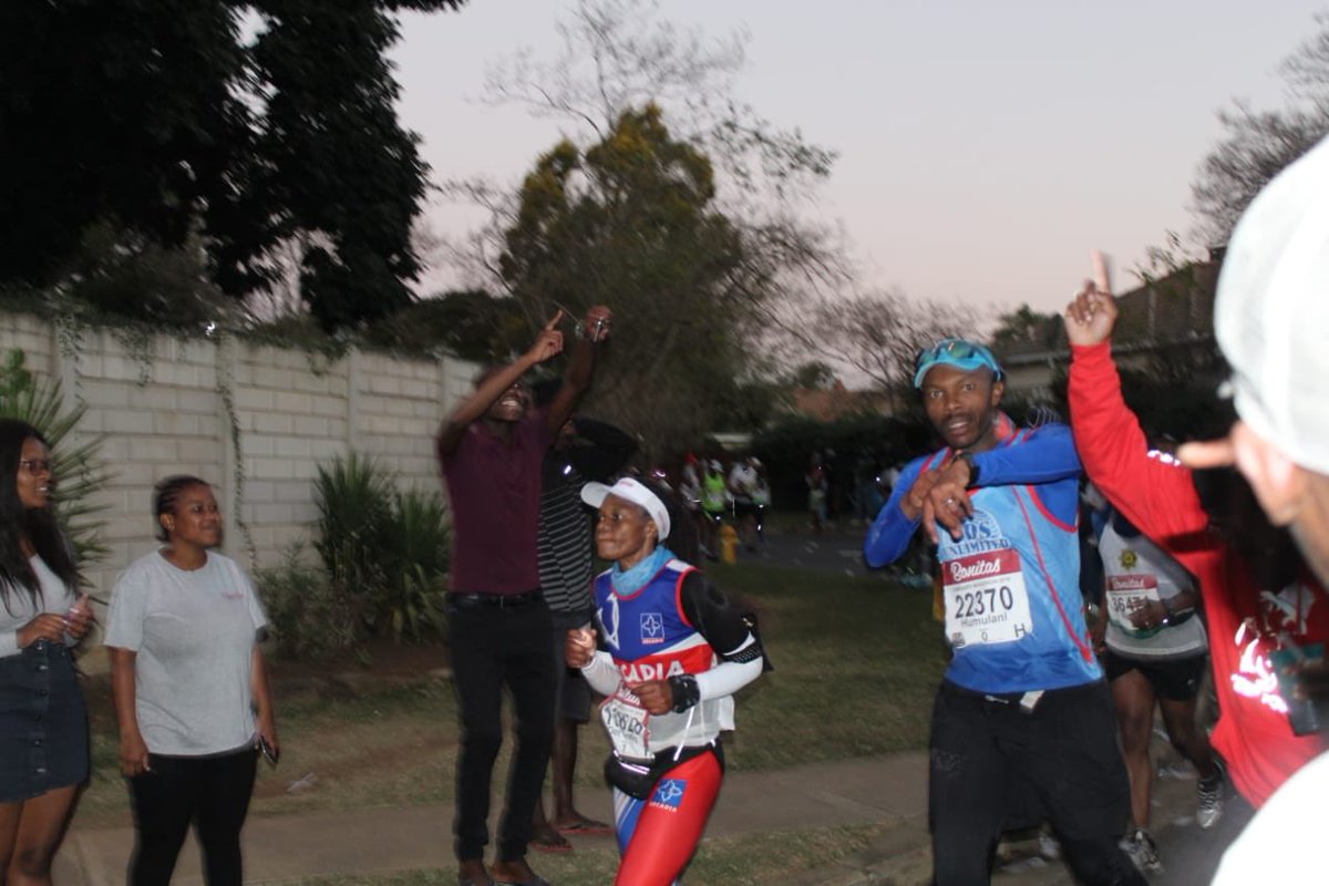 ..time to push the required pace to the finish line. As I approached, i saw them crossing the street towards me and as much as I wanted to stop and embrace them, i had to tell them to stay away from me because...Mkhulwana captured that moment as i was telling them 