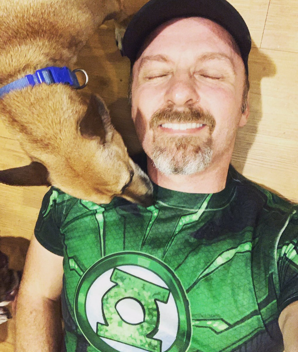 FitnessHappen's tweet photo. Calling in some assistance in recovering from this morning’s cardio. #tuesdaycardio #greenlantern #dogsoftwitter https://t.co/M5SPLJiF2p