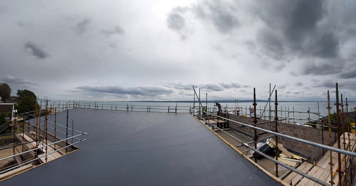 stratawaterpro's tweet photo. This sloped @DANOSAUK Danopol membrane roof will look spectacular as it overlooks Belfast Lough. Just awaiting fitting of standing seam. 

#danosa #strata #Belfast #roofing #danopol https://t.co/ZEeSRw7yye