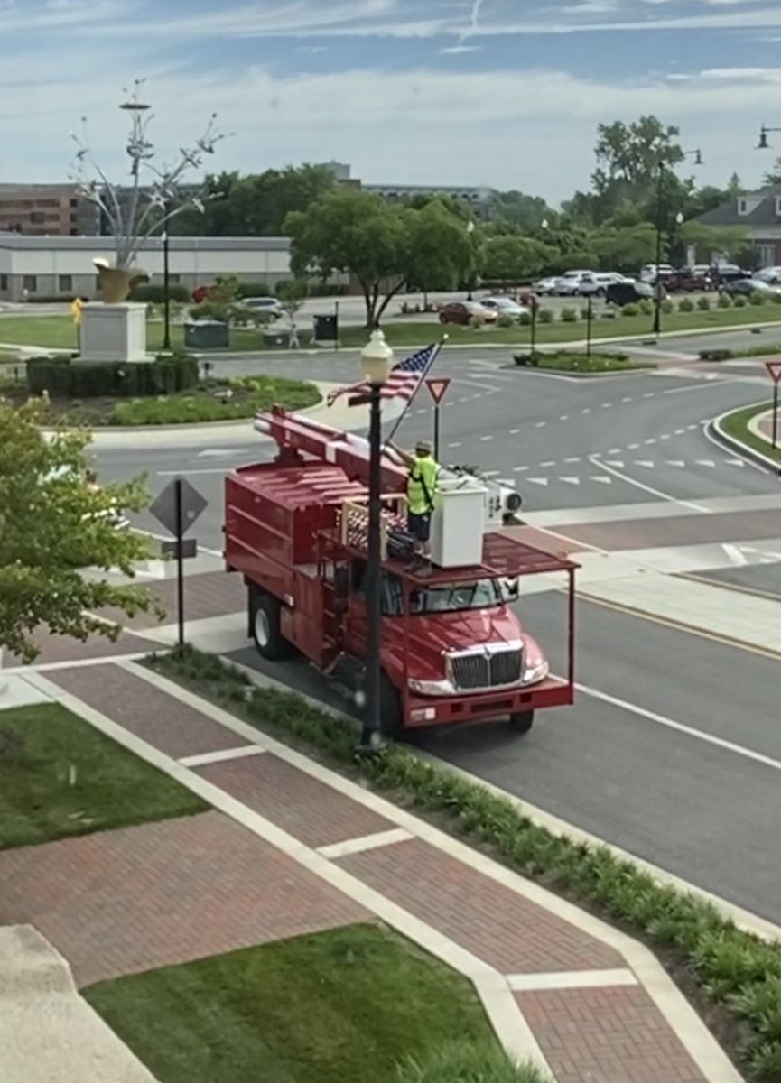 AnotherRab's tweet photo. It’s time for the #flags to adorn the #lightpoles... look at that magnificent #roundabout in the background! https://t.co/hI6lqqvolc