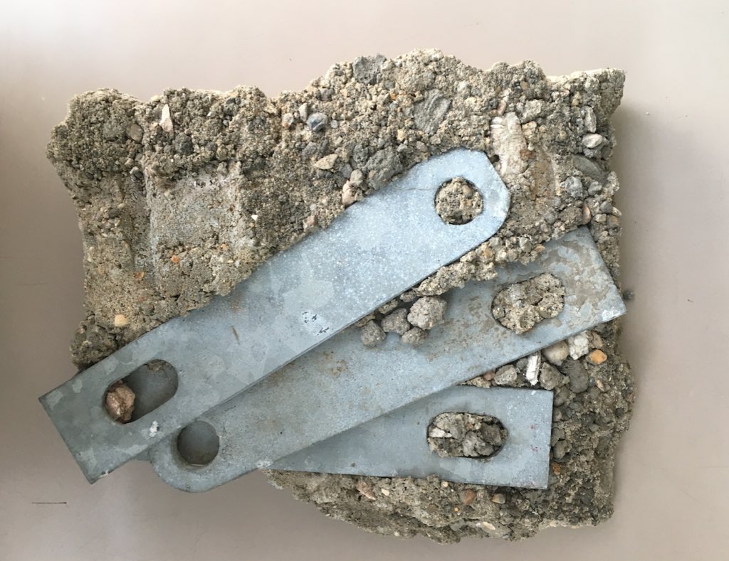 Here are some fragments from the demolition showing the terrible building quality