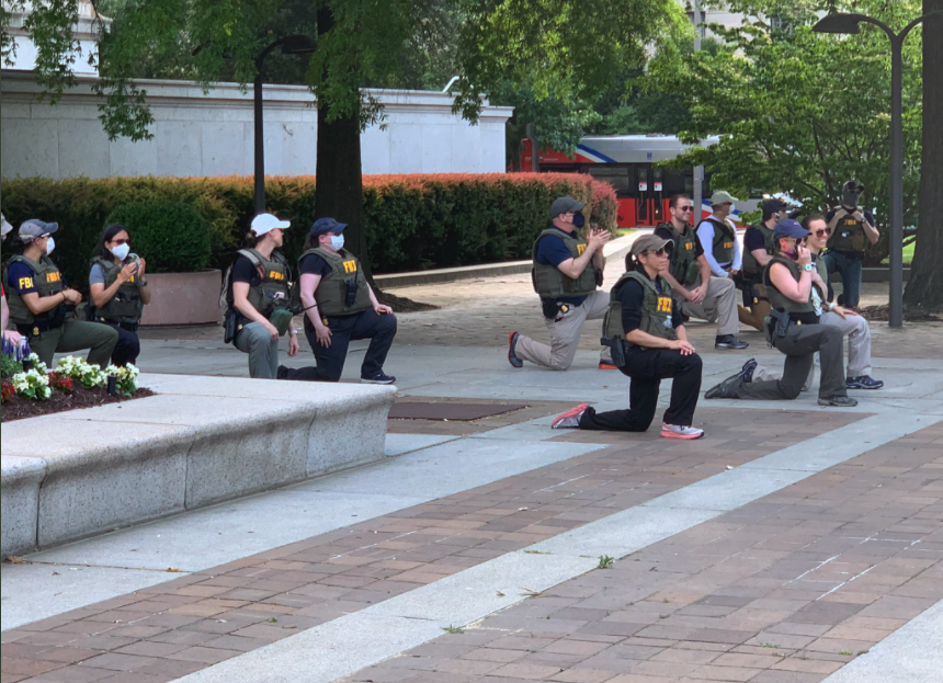 johnxdesouza's tweet photo. We believed Comey's CONTINUOUS whirwind of TREASON was the WORST thing that could ever happen to the FBI; THEN, this group of FBI personnel cornered by BLM said "hold our beer." #LeosForBLM
#surrenderToBLM #FBIShame https://t.co/lWrdbFtqIt