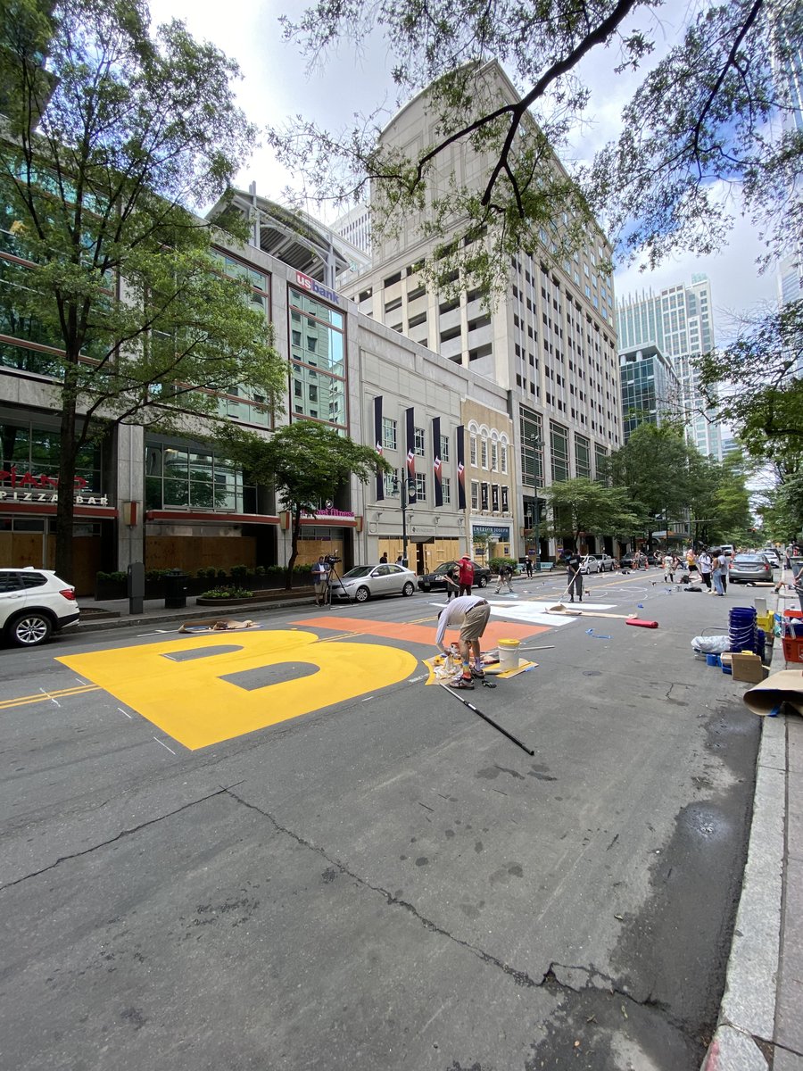 STREET MURAL: Local artists are painting a Black Lives Matter mural on a block of Tryon between 3rd and 4th streets Uptown today. The project is a collaboration between local artists, the city, Charlotte is Creative, Brand The Moth, and BlkMrktClt. Photos by <a href="/andyjweber/">Andy Weber</a>