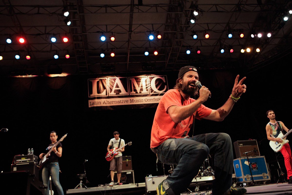 theLAMC's tweet photo. As we kick off this year’s LAMC, we are so saddened to learn of the passing our nuestro querido Pau Dones from Jarabe de Palo.  Today, this is how we choose to remember him. On stage, radiant and sharing his music and love with his fans. Rest in Peace Pau. Thank you for the songs https://t.co/LPAJDAawqd