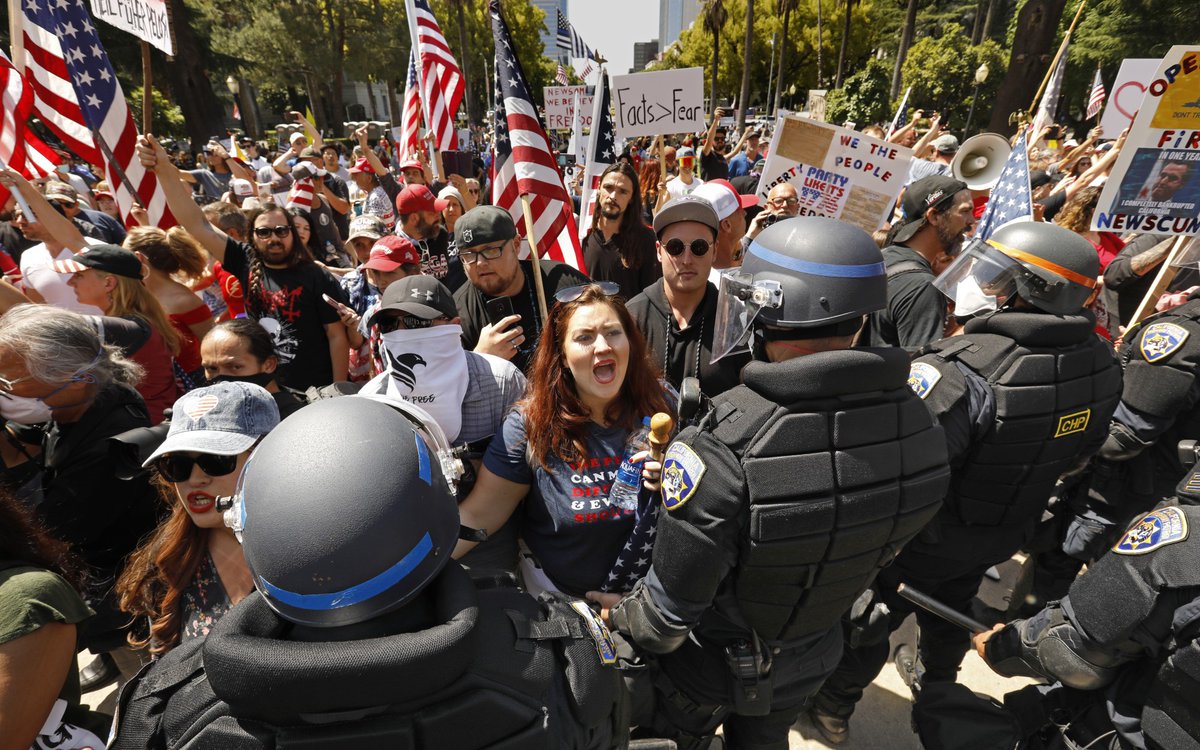 RobynElyse's tweet image. SUPER WEIRD how police officers managed to not brutally assault anyone in the large crowds of people protesting stay-at-home orders and pushing up against them. 

But, you know, one 75-year-old Catholic Worker guy and what else can they possibly do?