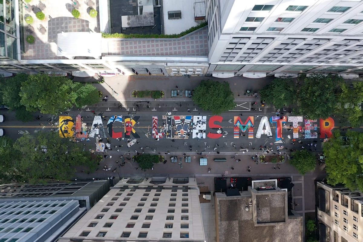 WBTV_News's tweet photo. A drone view of the "Black Lives Matter" mural painted along Tryon Street in uptown Charlotte. https://t.co/WbYAxtBTeE (Courtesy of David A. Thrower @7Hangtime on Instagram) https://t.co/yR09ZkEdHh