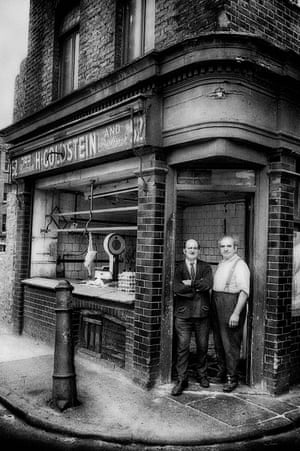 H Goldstein butchers, 1966.‘These two brothers owned the butcher’s shop. After I had taken the photograph I mentioned that they must have done well today as there was only one chicken left. One of the brothers replied “No! We only have one chicken!”’Photograph: John Claridge