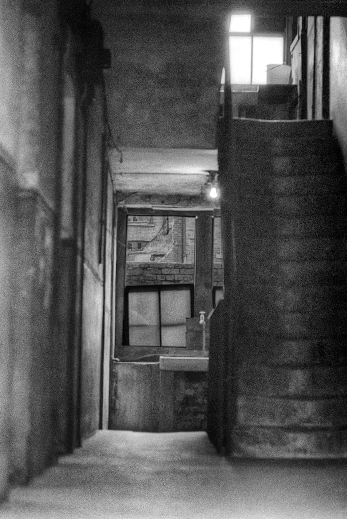 Housing, East End London, 1963.‘Everything was quiet in this building, almost like wandering into an unknown world. It was dark and damp with the stairs worn hollow. For me, it was both surreal and mundane at the same time’