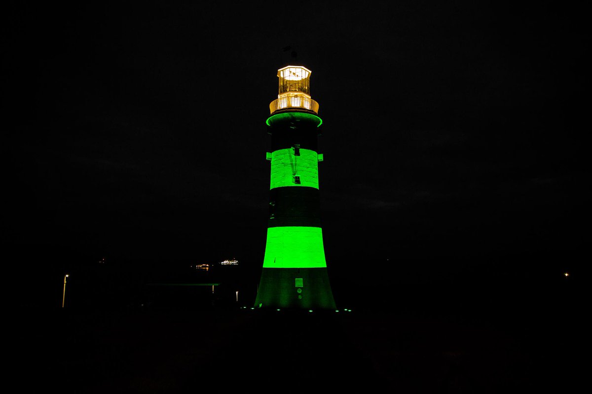 Argyle's tweet photo. 🟢 Thank you to @plymouthcc for turning Smeaton's Tower Green tonight, to celebrate our promotion back to @SkyBetLeagueOne #pafc https://t.co/oUwtYGvWCE