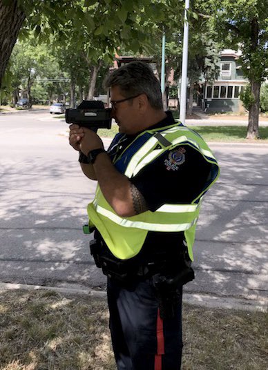 reginapolice's tweet image. Enforcement doesn’t always mean fines. 

Today, good drivers were rewarded with ‘pop from a cop’. Of 73 vehicles stopped - just 4 didn’t get a pop. Instead, they were given tickets for speeding in a school zone (including speeds up to 56 km/h in a 30 zone). #ProjectSPEED